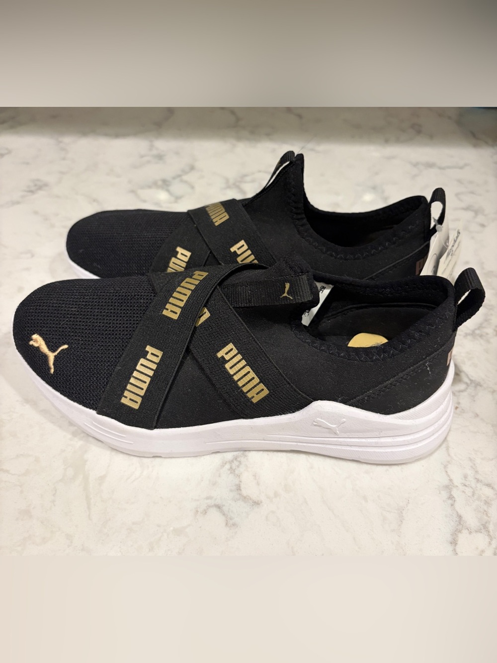 Puma Kids Black Slip-On Sneakers with Gold Logo and White Sole